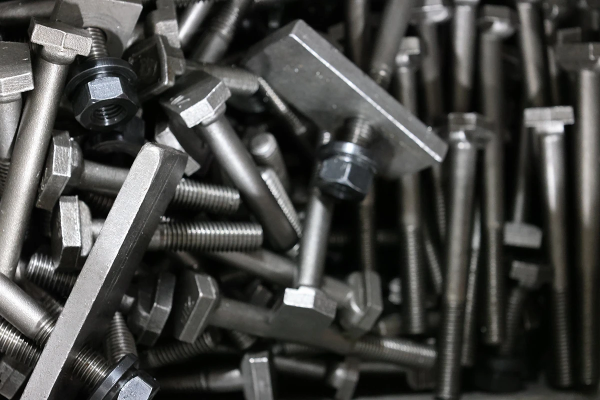 Metal fasteners and hardware close up for firearm parts manufacturing